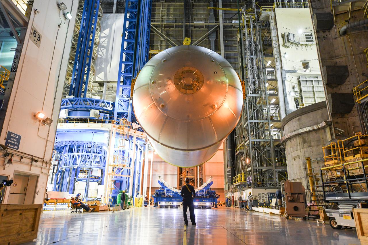 This image shows the latest progress NASA has made in manufacturing the liquid oxygen tank for the second core stage of NASA’s Space Launch System (SLS) rocket. The liquid oxygen tank will be used for the first crewed mission, Artemis II, of the agency’s Artemis program. Teams at NASA’s Michoud Assembly Facility in New Orleans recently completed internal cleaning of the liquid oxygen, or LOX, tank at the facility. Following the cleaning, crews prepared the propellant tank for the next phase of phase of assembly in a different area of the factory by moving, or breaking over, the tank from a vertical to horizontal position. The LOX tank is one of five major elements that make up the rocket’s massive 212-foot-tall core stage. The propellant tank holds 196,000 gallons of supercooled liquid oxygen to help fuel four RS-25 engines, and the internal cleaning ensures no contaminants make their way into the complex propulsion and engine systems of the deep space rocket. The stage, which includes a cluster of four RS-25, will produce more than 2 million pounds of thrust to help launch the SLS rocket and astronauts aboard NASA’s Orion spacecraft around the Moon for Artemis II.   NASA is working to land the first woman and the next man on the Moon by 2024. The agency’s SLS rocket offers more payload mass, volume capability and energy to speed missions through deep space and enable NASA’s Artemis lunar program. SLS, along with Orion, the human landing system, and the Gateway in orbit around the Moon are NASA’s backbone for deep space exploration. No other rocket is capable of carrying astronauts in Orion around the Moon in a single mission.
